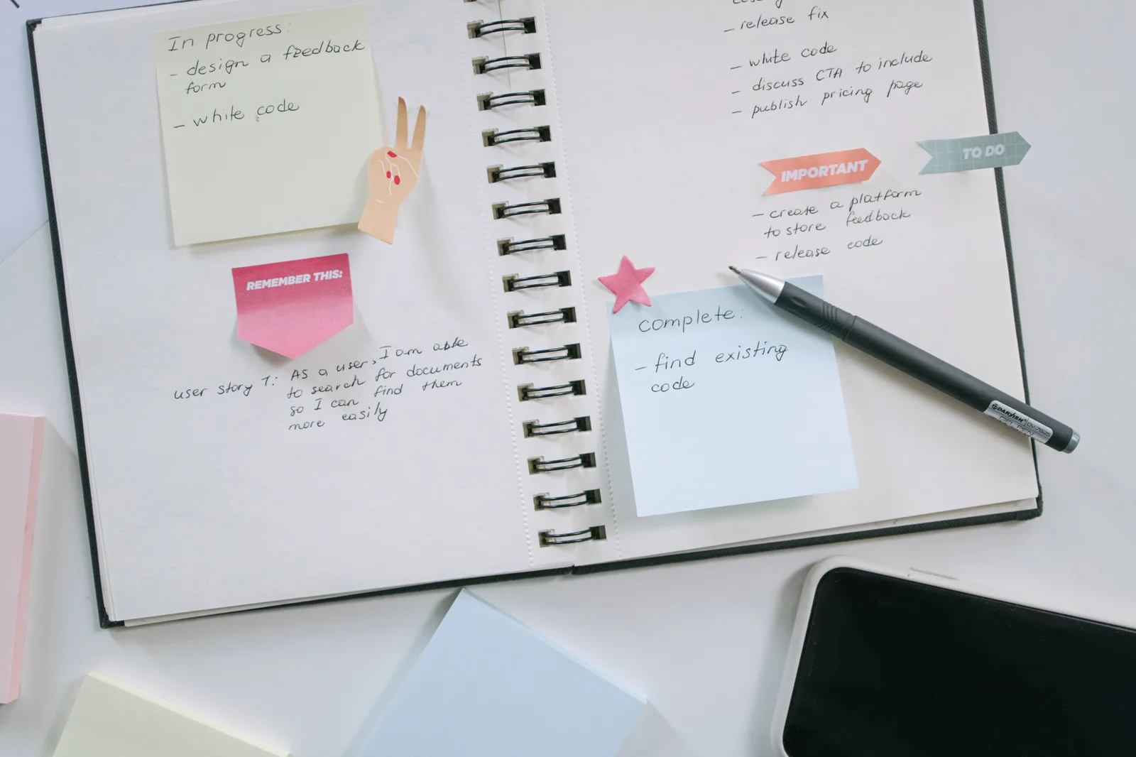 A modern workspace with a notebook, smartphone, and sticky notes emphasizing productivity and organization. Understanding incident response alternatives properly